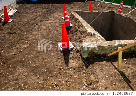 Vacant lot and traffic cones after demolition work a-1 132468687