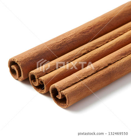 Three Rolled Cinnamon Sticks Isolated Three Rolled Cinnamon Sticks Isolated 132469550