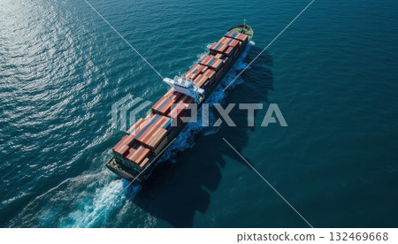 Aerial View of Cargo Ship Navigating Through Deep Blue Ocean Waters 132469668