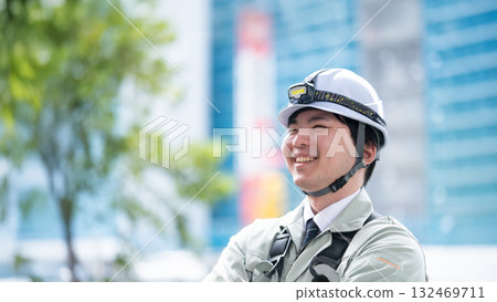Young workers working on-site (with tie) Young workers working on-site (with tie) 132469711
