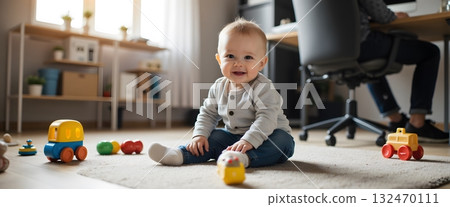 Happy toddler playing with colorful toys in a bright modern living space Happy toddler playing with colorful toys in a bright modern living space 132470111