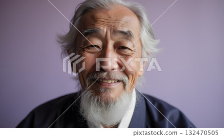 Elderly man with gray hair and beard smiling against soft pastel background Elderly man with gray hair and beard smiling against soft pastel background 132470505