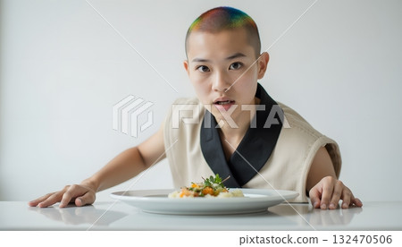Eager Individual with Vibrant Hair Examining Plate of Gourmet Cuisine 132470506
