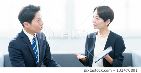 Business people having a meeting using a tablet Business people having a meeting using a tablet 132470891