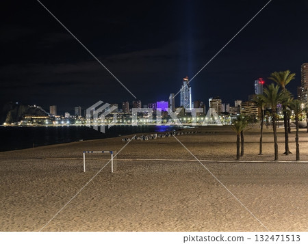 serene coastal city after dusk, nighttime seaside scene featuring city lights and peaceful ambiance serene coastal city after dusk, nighttime seaside scene featuring city lights and peaceful ambiance 132471513