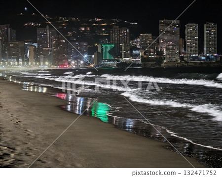 luminous skyline with diverse architecture reflected in tranquil waters during lively nocturnal 132471752