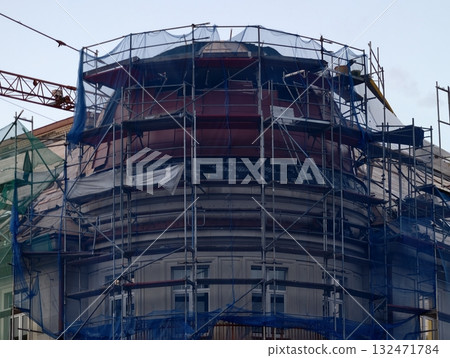 luminous skyline with diverse architecture reflected in tranquil waters during lively nocturnal 132471784