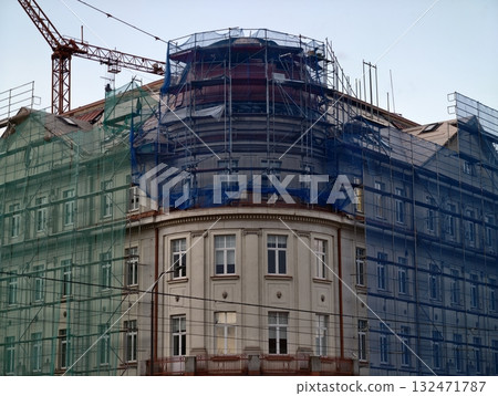 luminous skyline with diverse architecture reflected in tranquil waters during lively nocturnal 132471787