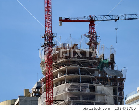 luminous skyline with diverse architecture reflected in tranquil waters during lively nocturnal 132471799