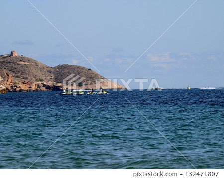 luminous skyline with diverse architecture reflected in tranquil waters during lively nocturnal 132471807