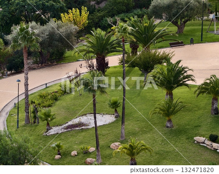 sunny garden retreat, bright tropical garden featuring winding walkways and picnic spots sunny garden retreat, bright tropical garden featuring winding walkways and picnic spots 132471820