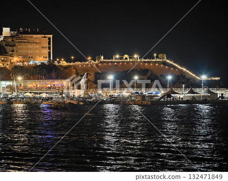 bridge illuminates nighttime, soft lights highlight elegant bridge spanning tranquil harbor scene bridge illuminates nighttime, soft lights highlight elegant bridge spanning tranquil harbor scene 132471849