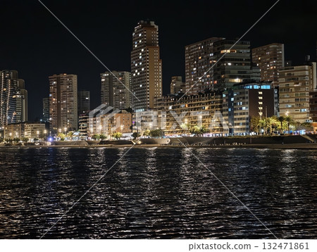 luminous skyline with diverse architecture reflected in tranquil waters during lively nocturnal luminous skyline with diverse architecture reflected in tranquil waters during lively nocturnal 132471861