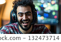 Creating innovative video games, excited expression, gaming setup, Arab game developer 132473714