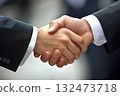 Successful business partners shaking hands in agreement, sealing deal 132473718