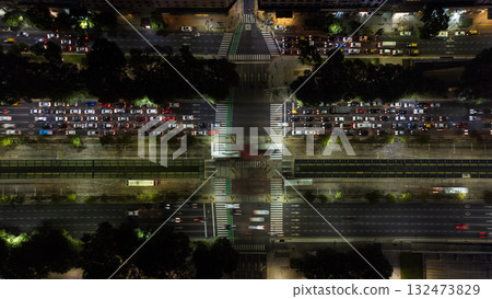 Night aerial view of the traffic on Av. 9 de Julio in the city of Buenos Aires. Night aerial view of the traffic on Av. 9 de Julio in the city of Buenos Aires. 132473829