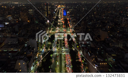 Night aerial view of the traffic on Av. 9 de Julio in the city of Buenos Aires. Night aerial view of the traffic on Av. 9 de Julio in the city of Buenos Aires. 132473831