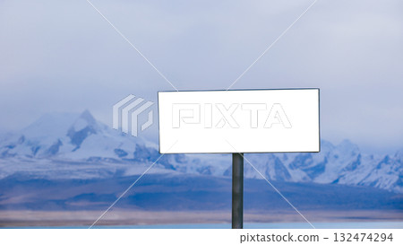 Empty billboard and snow capped mountain landscape Empty billboard and snow capped mountain landscape 132474294