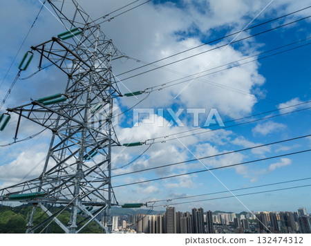 Aerial view of high voltage electricity tower on mountain Aerial view of high voltage electricity tower on mountain 132474312