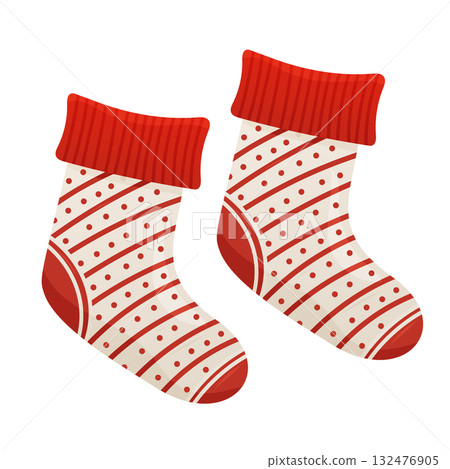 Two festive red and white striped Christmas socks with polka dots, holiday decoration Two festive red and white striped Christmas socks with polka dots, holiday decoration 132476905