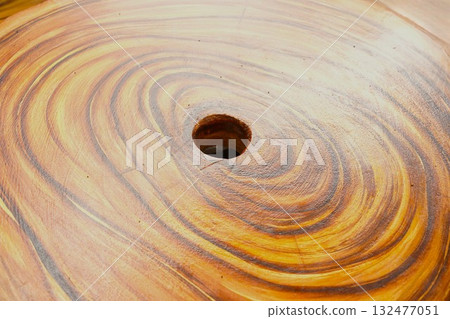 Wooden board with visible tree rings 132477051