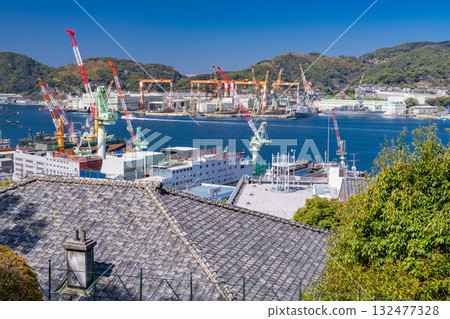 Nagasaki Prefecture: Port scenery of Nagasaki Port and the cityscape with shipyards Nagasaki Prefecture: Port scenery of Nagasaki Port and the cityscape with shipyards 132477328