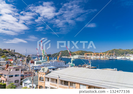 Nagasaki Prefecture: Port scenery of Nagasaki Port and the cityscape with shipyards Nagasaki Prefecture: Port scenery of Nagasaki Port and the cityscape with shipyards 132477336