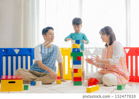 Children and nursery teachers playing at nursery school Children and nursery teachers playing at nursery school 132477810