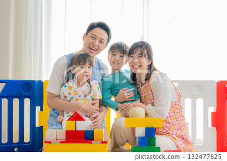 Children and nursery teachers playing at nursery school 132477825