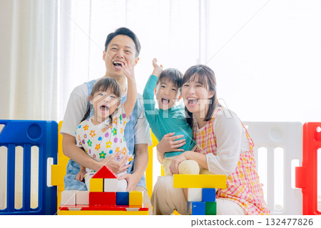 Children and nursery teachers playing at nursery school 132477826