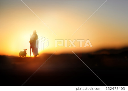 Jesus Christ, a shepherd walking with sheep on a meadow, Christian Jesus background 132478403