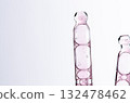 Skin serum in a pipette. A cosmetic product for body care. White background. Copy space 132478462