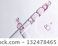 Skin serum in a pipette. A cosmetic product for body care. White background. Copy space 132478465