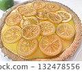 A refreshing lemon cream tart with the sweet and sour taste of lemon slices. 132478556