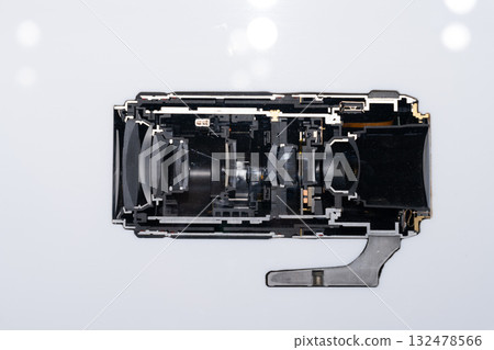 Cross-sectional disassembly of a precision optical camera lens Cross-sectional disassembly of a precision optical camera lens 132478566