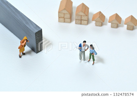 Image of a woman taking a photo with a camera 132478574