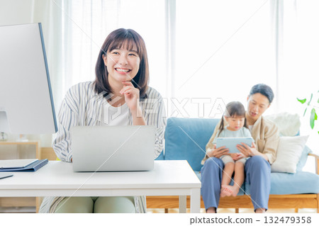 mom and family working at home mom and family working at home 132479358