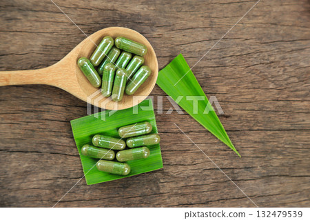 Herbal capsules from green pandan leaf herbal on hand for healthy eating in daily life 132479539