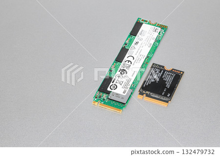NVME PCIe solid-state drive in the M.2 2230 and 2280 form factor isolated on white background. NVME PCIe solid-state drive in the M.2 2230 and 2280 form factor isolated on white background. 132479732