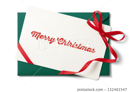 A Christmas card in a green envelope with a red ribbon A Christmas card in a green envelope with a red ribbon 132481547