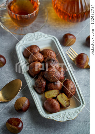 Chestnuts simmered in their skins | A refined dessert with the aroma of syrup 132482784