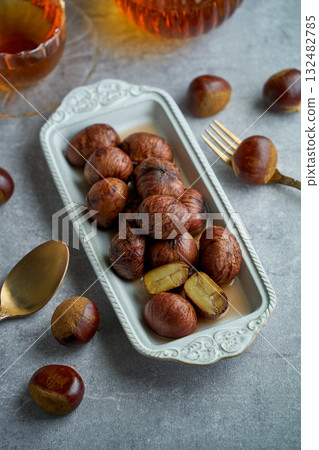 Chestnuts simmered in their skins | A refined dessert with the aroma of syrup 132482785