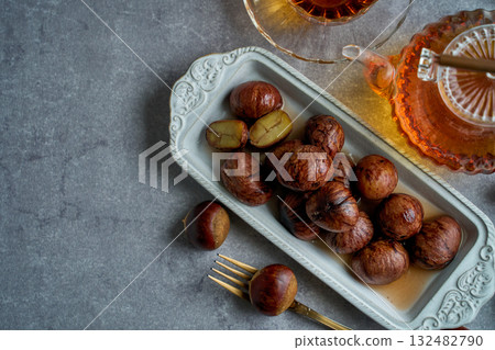 Chestnuts simmered in their skins | A refined dessert with the aroma of syrup 132482790