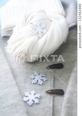 Getting ready for winter: Duffle coat, knitted hat and scarf Getting ready for winter: Duffle coat, knitted hat and scarf 132482898