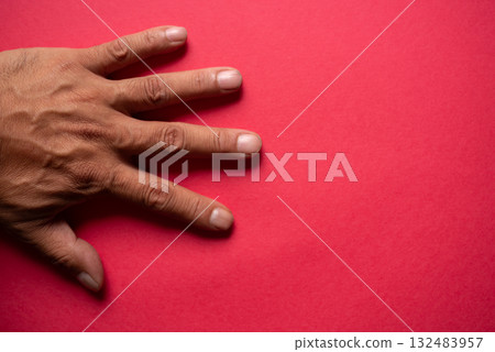 Hands on a red background 132483957