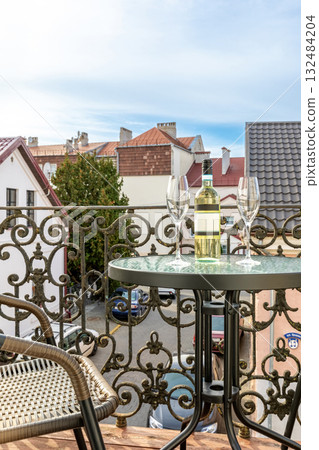 Romantic Balcony with Wine and Old Town View 132484204