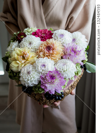 Woman holding bright bouquet Woman holding bright bouquet 132484593