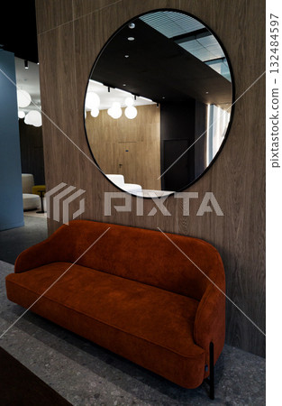 Modern orange textile sofa with mirror. Modern orange textile sofa with mirror. 132484597