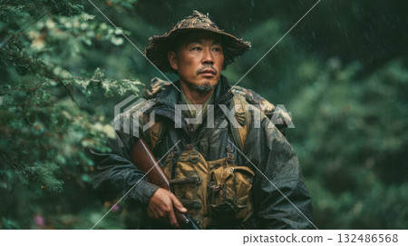 Hunter on guard in the rain forest 132486568