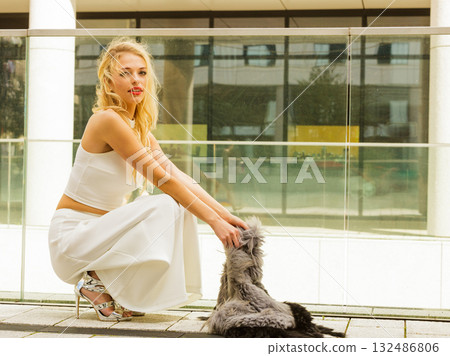 Woman wearing crop top and culottes Woman wearing crop top and culottes 132486806